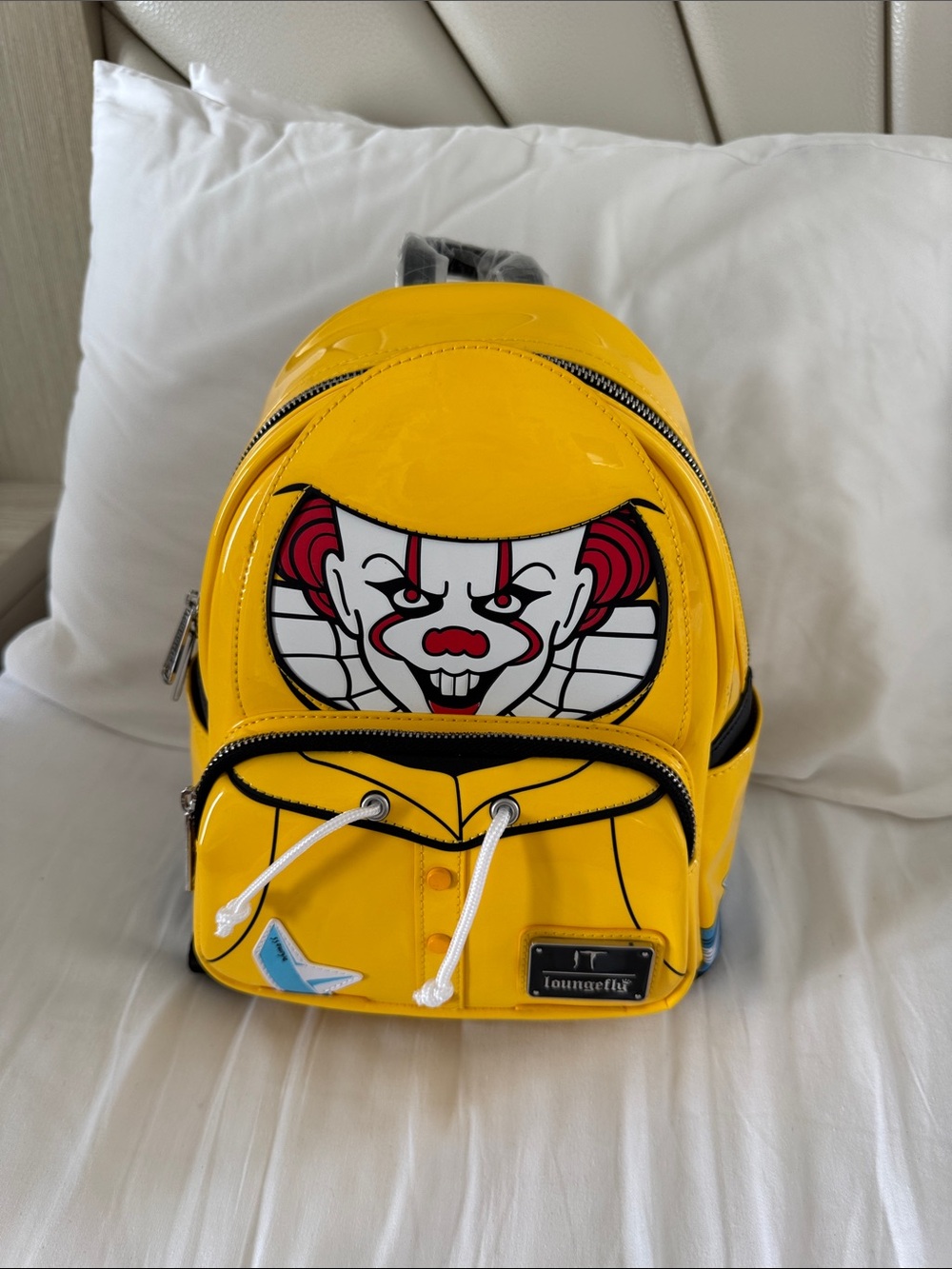Loungefly it pennywise raincoat glow in the dark mini backpack NWT